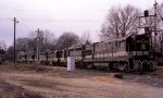 A string of 6 locos backs down towards Glenwood Yard